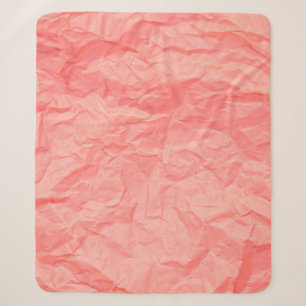 Close up of pink wrinkle crumpled old with paper p sherpa blanket