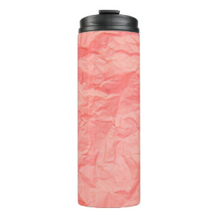 Close up of pink wrinkle crumpled old with paper p thermal tumbler