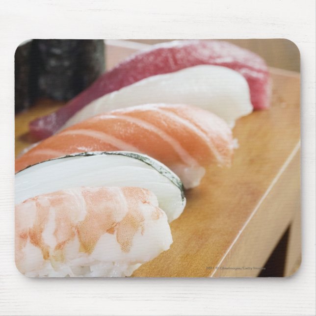 Close-up of sushi on a table mouse pad (Front)