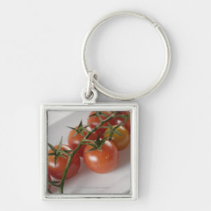Close-up of tomatoes on a tray key ring