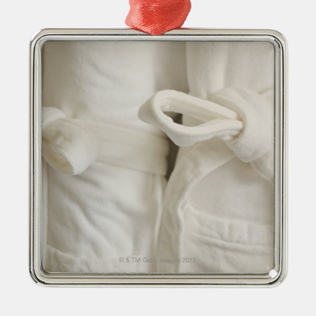 Close up of towels in spa metal tree decoration (Front)