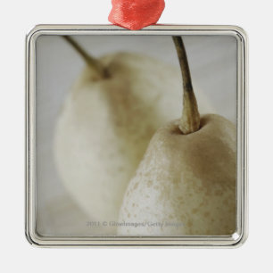 Close-up of two pears metal ornament