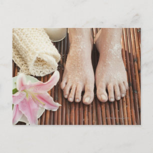 Close-up of womans feet having spa treatment postcard