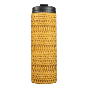 Close up of yellow knitted textured background. Tr Thermal Tumbler