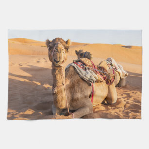 Close-up on funny camel in Oman Wahiba desert Tea Towel