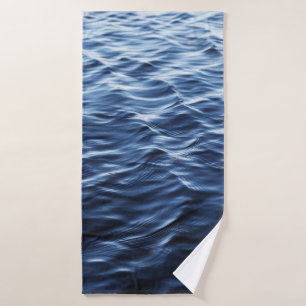 CLOSE UP PHOTO OF BODY OF WATER BATH TOWEL