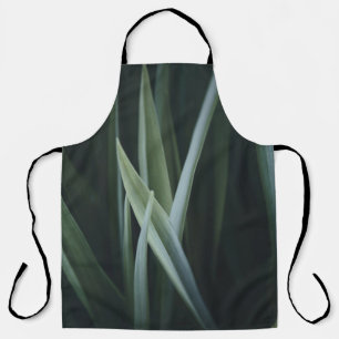 Close up photo of green linear leaves apron