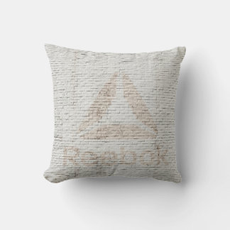 Close-up photo of Reebok logo on wall Cushion