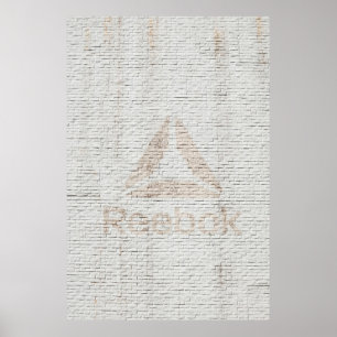 Close-up photo of Reebok logo on wall Poster