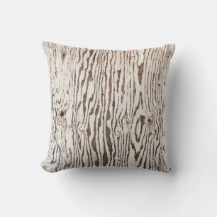 Close up photography of brown wooden surface cushion