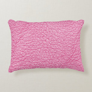 Close-up pink leather, textured background. decorative cushion