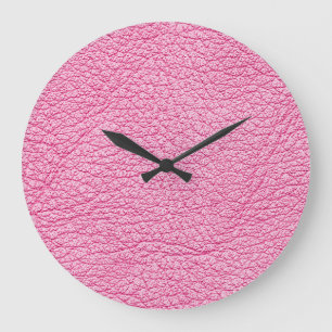 Close-up pink leather, textured background. large clock