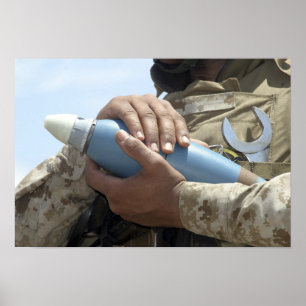 Close-up view of a soldier cradling a munition poster