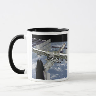 Close up view of the Shuttle docked Mug