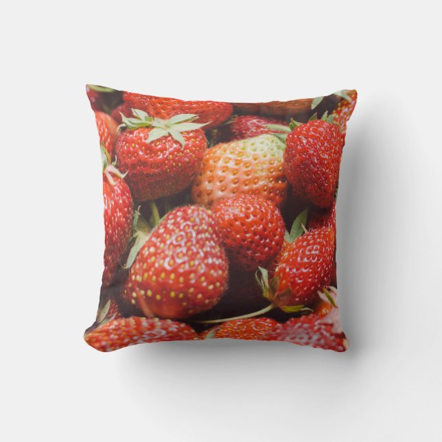 Close-up view on fresh summer strawberry with vint cushion (Front)