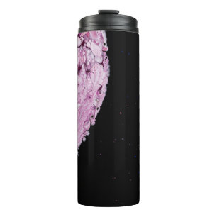 Close view of pink planet cartoon image thermal tumbler