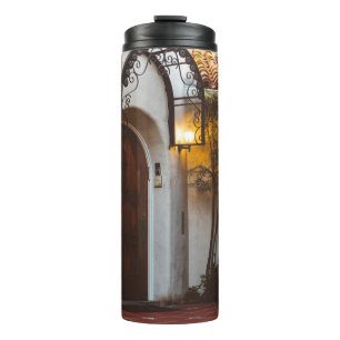 CLOSED BROWN WOODEN DOOR DURING DAYTIME THERMAL TUMBLER