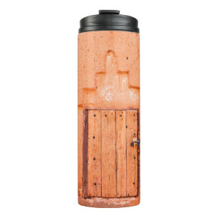 Closed wooden window in traditional moroccan house thermal tumbler