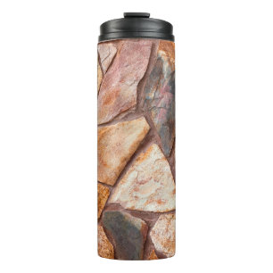 Closeup of a stone wall as a backgroundwallpaper,p thermal tumbler