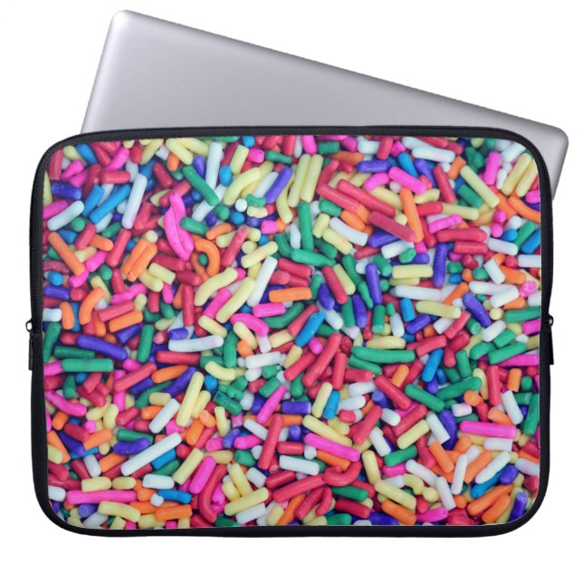 Closeup photo of assorted-colour decor laptop sleeve (Front)