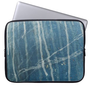 Closeup photo of blue wall paint laptop sleeve