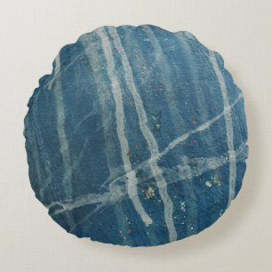 Closeup photo of blue wall paint round cushion