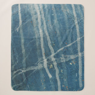Closeup photo of blue wall paint sherpa blanket