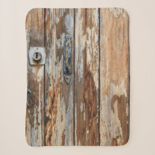 Closeup photo of brown wooden board sherpa blanket