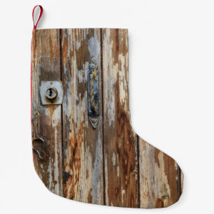 Closeup photo of brown wooden board small christmas stocking