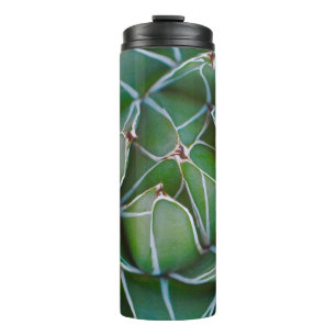 Closeup photo of green and white plant thermal tumbler