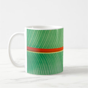 Closeup photo of green leaf coffee mug