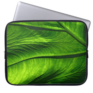 Closeup photo of green leaf laptop sleeve