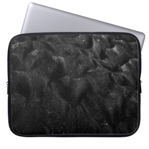 Closeup photo of sand laptop sleeve