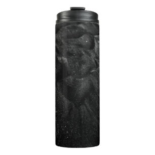 Closeup photo of sand thermal tumbler