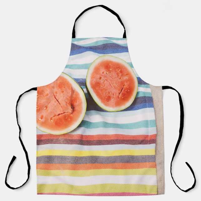 Closeup photo of slice watermelon fruits on cloth apron (Front)