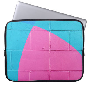 Closeup photo of teal and pink wall laptop sleeve