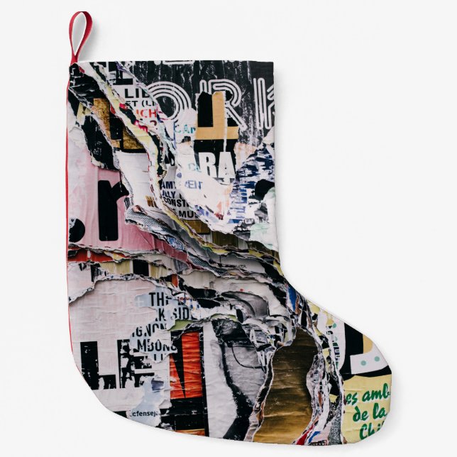 Closeup photo of torn papers small christmas stocking (Front)