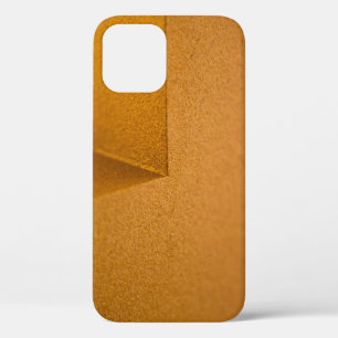 Closeup photo of yellow wall iPhone 12 case