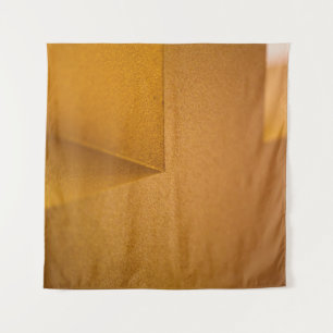 Closeup photo of yellow wall tapestry