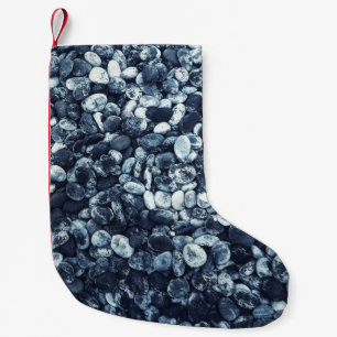 Closeup photography of stones small christmas stocking