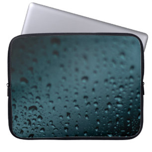 Closeup photography of tear drops laptop sleeve