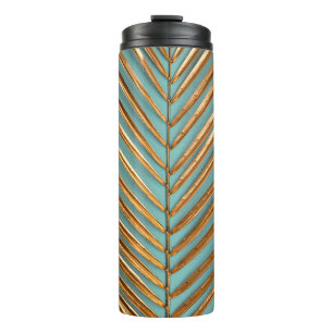 Closeup view of gold painted natural tropical date thermal tumbler