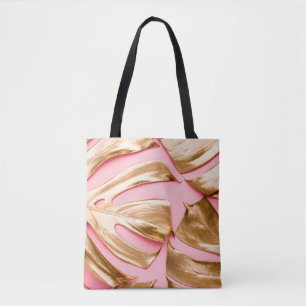 Closeup view of natural gold painted monstera trop tote bag