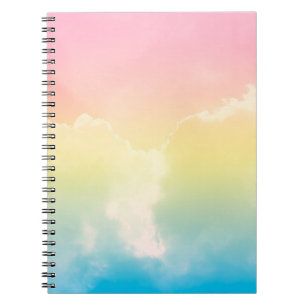 cloud background with a pastel coloured gradient. notebook