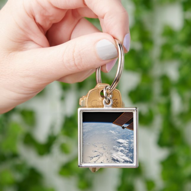 Cloud Formations Surrounding Sunglint Off Pacific Key Ring (Hand)