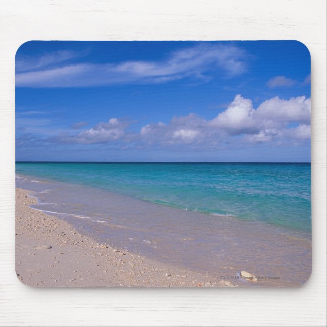 Cloud in blue sky over sandy beach mouse pad (Front)