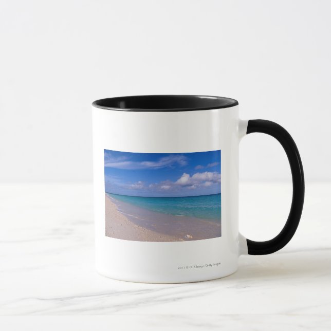 Cloud in blue sky over sandy beach mug (Right)