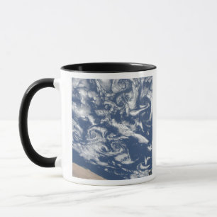 Cloud vortex streets off the coast mug