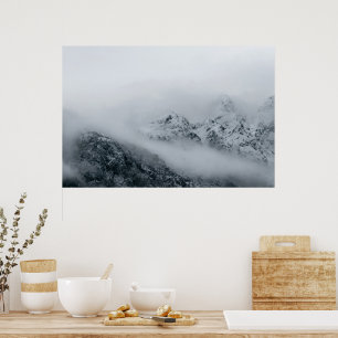 Clouds flowing over mountains poster