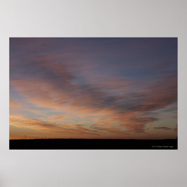 Clouds In An Orange Sky At Sunrise Poster (Front)